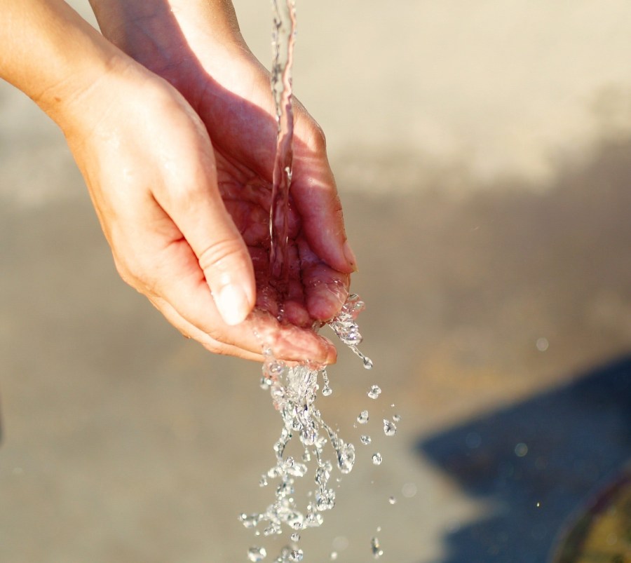 woman-water-fingers-hands-fountain